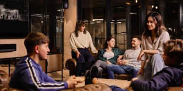 group of students sat in a common area