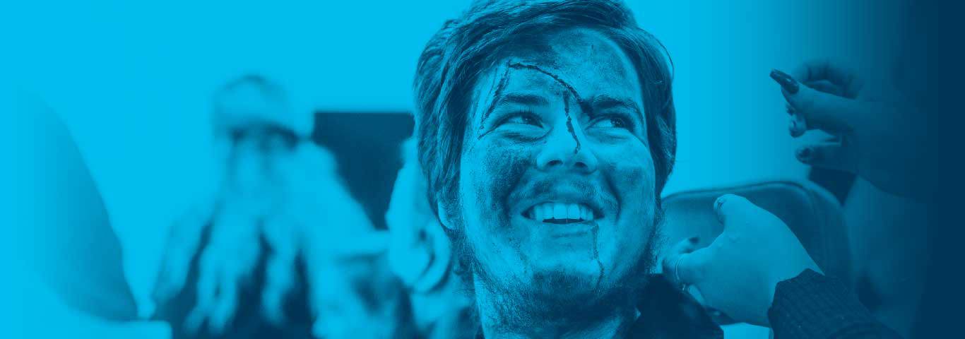 Creative Hair Media Makeup model with blue overlay