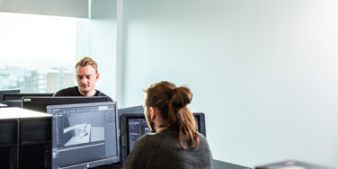 two students working on 3d modelling on campus