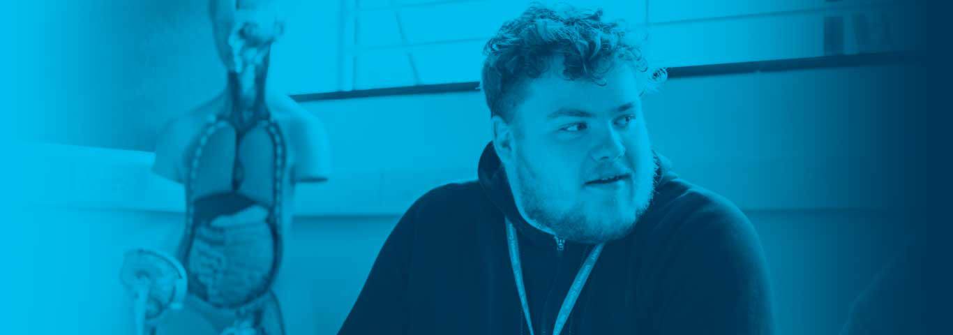 health student looking to the right, blue overlay