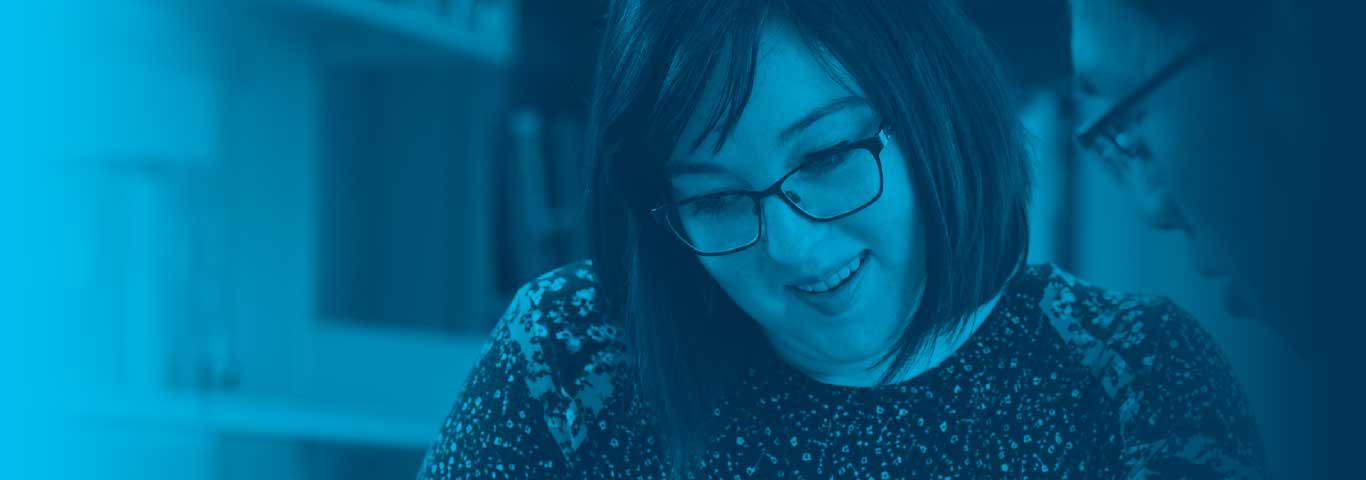 tutor teaching with blue overlay