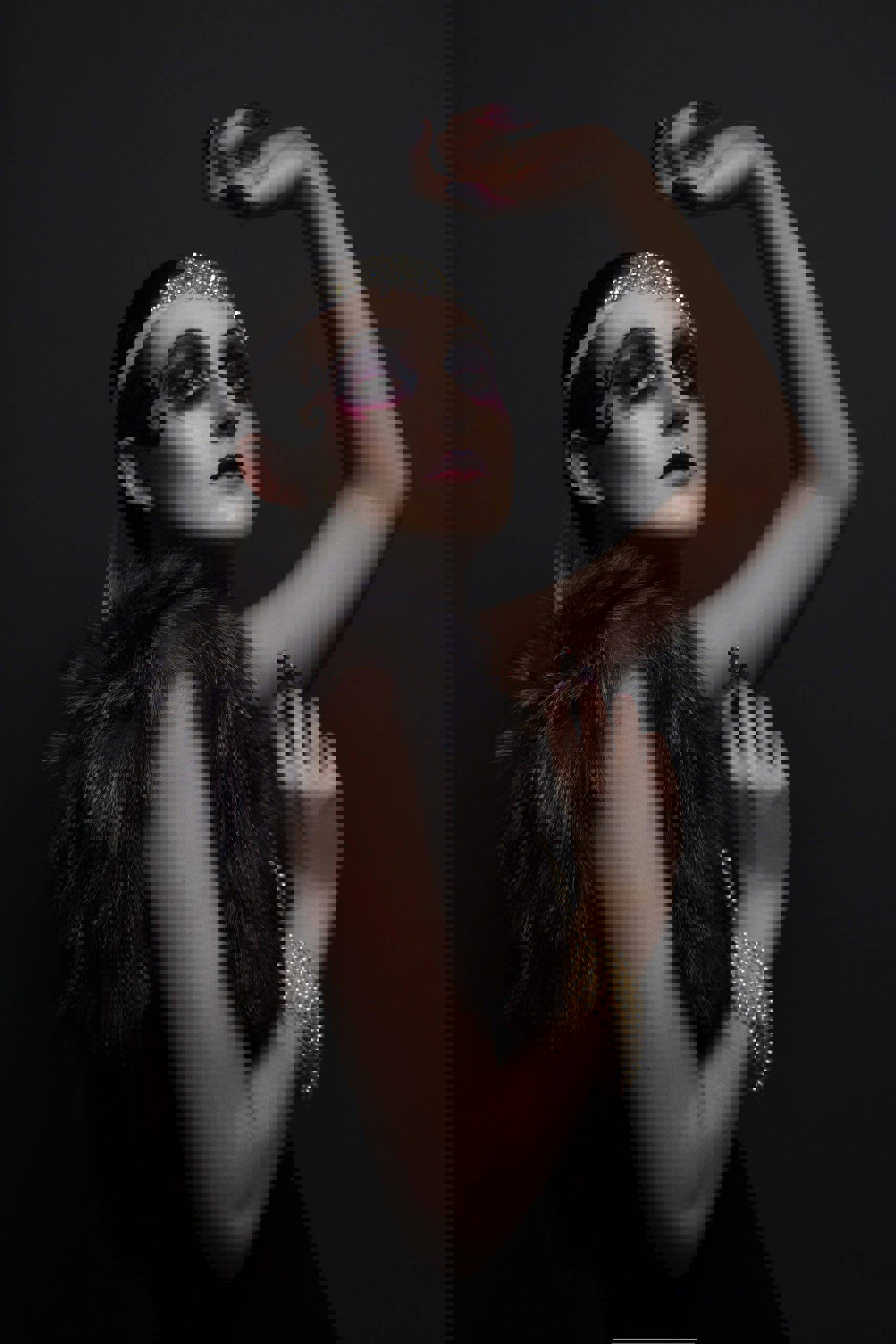 a woman with makeup and fur vest holding a bottle of liquid