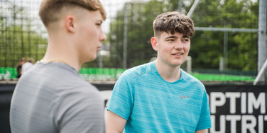 University Centre Leeds students on a football field 