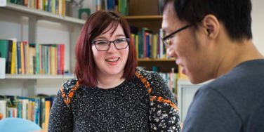 tutor smiling at a student